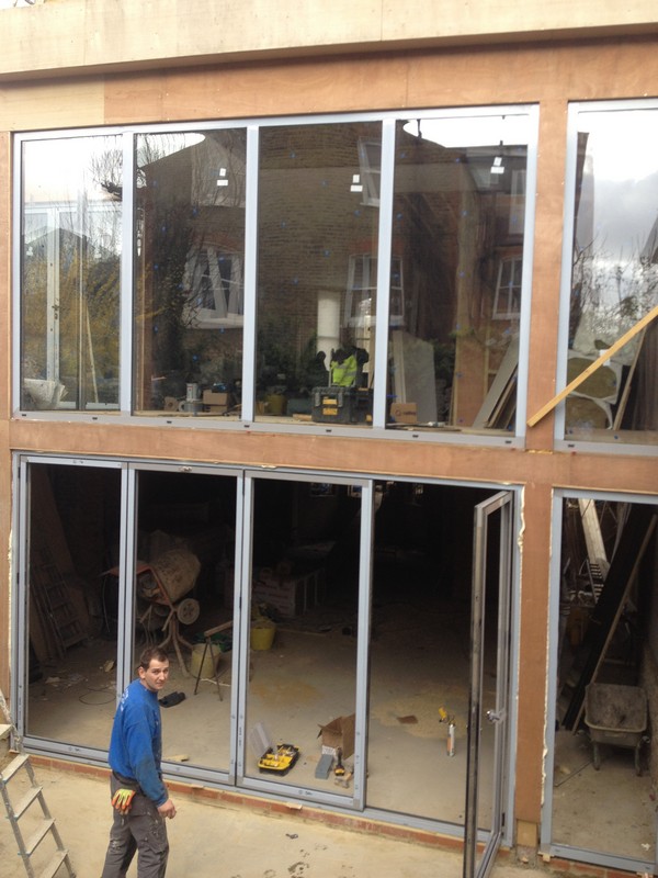 Aluminium bi-fold doors with two-storey glazing in Hither Green