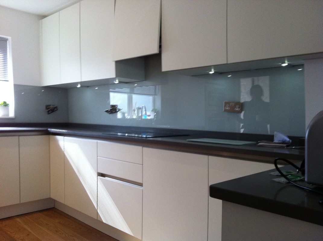 Grey glass kitchen splashback with LED lighting in Hither Green